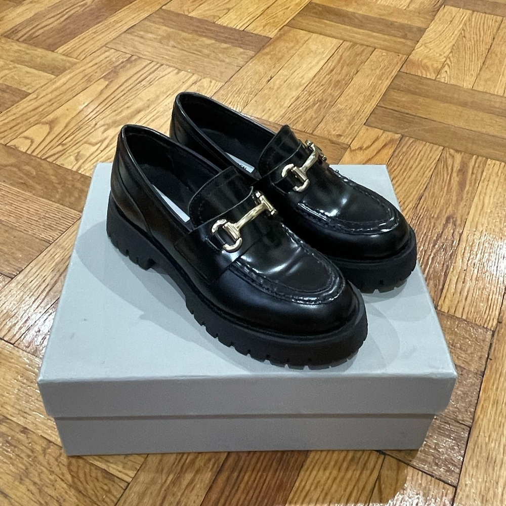Black Women’s Lug Sole Loafers with Gold Bit Hardware